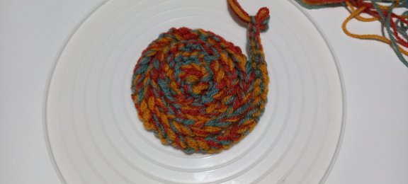 Game-1-circular-crochet-coaster-image-e-by-anino-ogunjobi-and-crafters-media